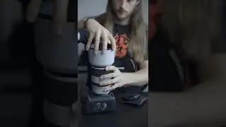What the trap door on a lens hood is for