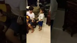 Little Sister disturbing the Brother.