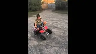 Quadrocycle 2 wheels boy ride /  Мальчик на квадроцикле на двух колеса