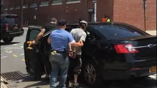 RAW FOOTAGE UNDERCOVER OFFICERS ARREST A SUSPECT AS HE WALKS DOWN THE BLOCK