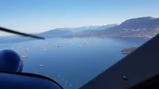 Small plane over Vancouver