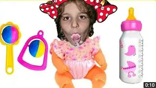Nastya found a doll and pretends to be a parent