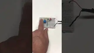 A Boolean AND circuit using two transistors.