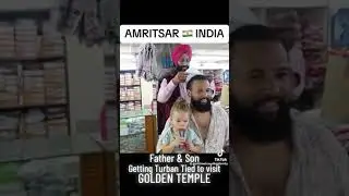 Father and son get turban and patka tied before visiting Darbar Sahib in Amritsar.
