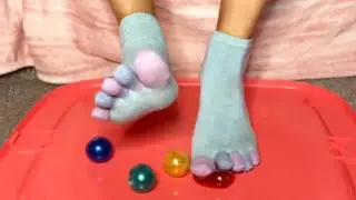 Squishing sticky balls with my feet