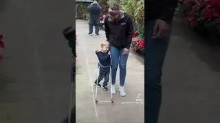 Blind Toddler explores botanical garden with belt cane!