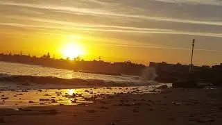 Tranquil Sunrise Over Calm Sea: Relaxing Waves in Mohammedia, Casablanca, Morocco