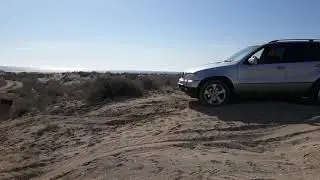 Спуск подъем песок BMW E53