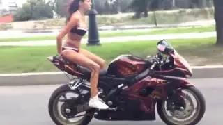 Sexy Girl Is Showing Some Amazing Skills On A Motorbike
