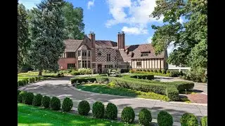 Poised on 1.3 acres overlooking the Denver Country Club golfcourse