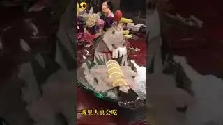 Кытайдагы дастаркон устундогу тиру балыктар