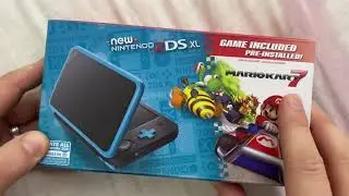 Unboxing a new Nintendo 2DS XL with Mariokart 7