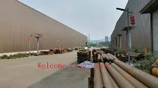 Warehouse or workshop building with long span space frame roof canopy
