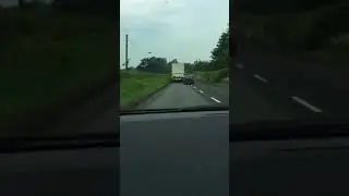 Car tries to overtake lorry and narrowly misses getting hit by oncoming lorry | CONTENTbible