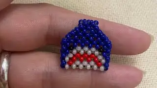 Акула из бисера в технике крестик. 