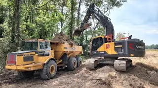 Building The Next Part Of The Road Through The Woods
