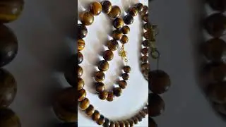 Retour client collier perles œil de chat