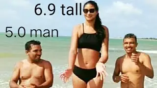 Tall girl is double the size of man