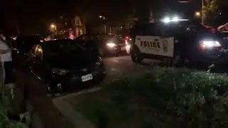 Police Drive Car Through Crowd