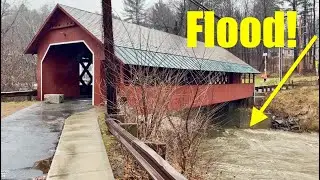 Whetstone River flooding at The Creamery covered bridge and Farmers Market in Brattleboro, Vermont.