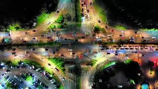 4K Drone Footage Of Crossroad Traffic Cars Night City