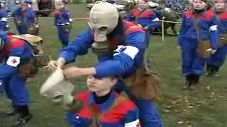 Women donning gas masks