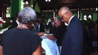 Dela G serving at Sav Parish Church