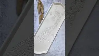 Hand-building a peacock platter. Checkout the full tutorial on my channel! #handmadeceramics