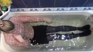Russian Home Wetlook - rhw_061. Warm bath in long-sleeve sweatshirt, dark tights, and black skirt.