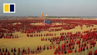 Indian women make massive human circles in traditional dance