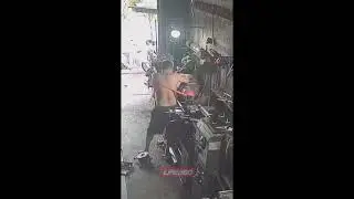 Man has shirt shredded off in lathe machine