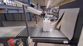 Автоматическая упаковка ПЭТ 1,5л (группа 2х3) в пленку - машина ТМ-1А