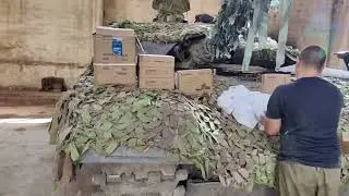 Передача груза помощи для танкового полка 9й бригады