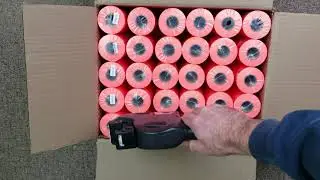 Garvey label gun applicator putting labels on packages