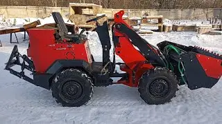 Homemade mini-loader with rear linkage.