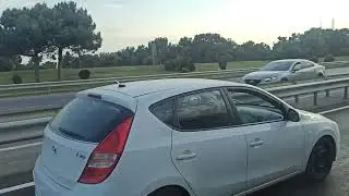 After a traffic jam we drive along the highway