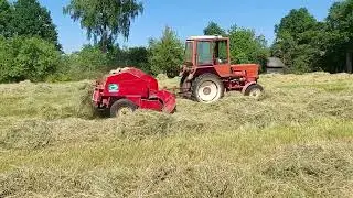 "Я календарь переверну, и снова мне пора косить, я календарь переверну и снова мне в работу пора..."