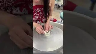 Tiny porcelain bowl thrown and trimmed on the wheel, sped up