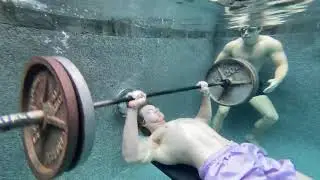 Man Does Weightlifting Underwater Inside Pool