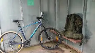 2024-07-21 ПРЯЧУСЬ С ВЕЛОСИПЕДОМ ОТ ДОЖДЯ НА ОСТАНОВКЕ