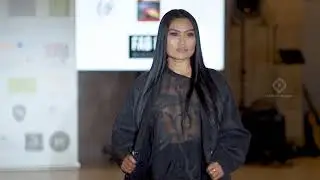 Model wearing sheer outfit at Fashion show 2021
