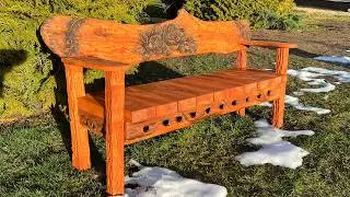 Wooden carved bench with roses
