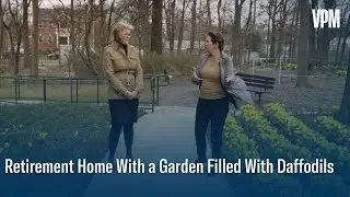 A unique retirement home in Arlington featuring a garden filled with daffodils