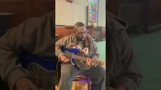 Live playing guitar