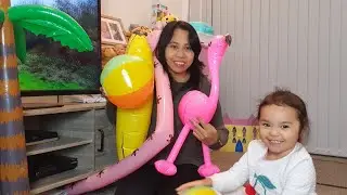 BLOWING UP THE INFLATABLE PALM TREE BEACH BALL FLAMINGO
