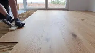 Installation of hardwood floor on a floated cement screed