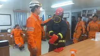 How to properly don a fireman's outfit.