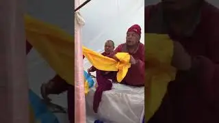 Ven. Ngawang Samten offering khatas to the site of Lama Zopa Rinpoche's stupa