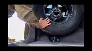 Mount a 235/75R15 spare tire inside XJ Cherokee (or smaller)