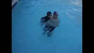 Koko's turn to get the rock under the pool